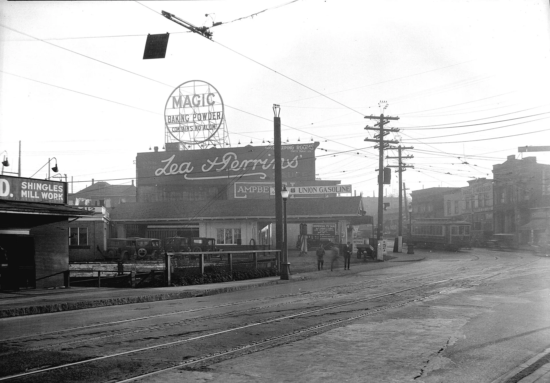 Vancouver . Taken for Duker and Shaw Ltd., billboard advertising looking south on Granville at south end of Granville Bridge at 4th.
