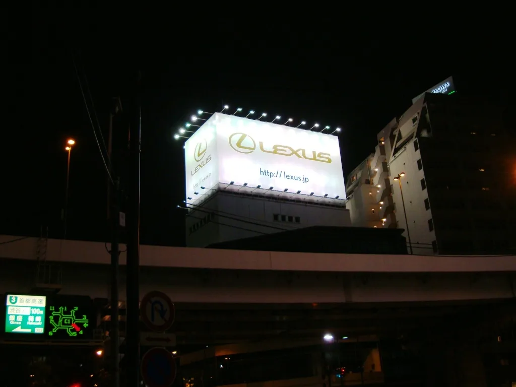 Lexus`s billboard at night, on Rute 246 (Tamagawa-dori Avenue)at Shinsen-cho crossing in Meguro Ward near Shibuya district, Tokyo