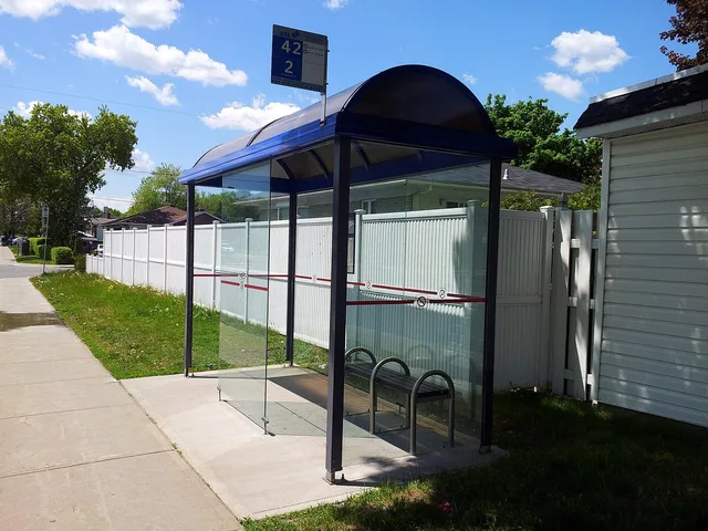 bus stop, shelter, street, grass, urban, transportation, public, nature, sky. What a workable out of home advertising strategy means for UK media planning