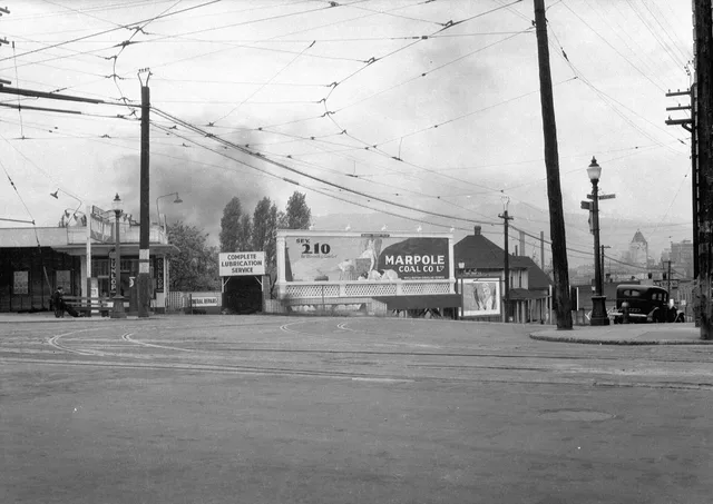 Cambie Street between 8th Avenue and Broadway Vancouver . Photograph shows a lighted Ruddy-Duker Ltd. billboard advertising Marpole Coal Company. Out of home advertising rules for England campaigns: CAP Code, planning and data protection