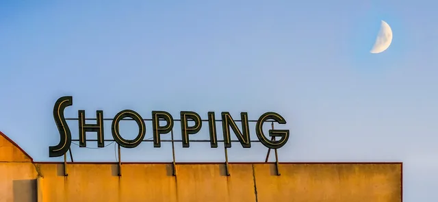 shopping, supermarket, moon, sky, contrast, shop, retail, store, blue sky, night sky, grocery, business, buy, purchase, e-commerce, blue, contrasting, nature, orange, sign, commercial, finance, outside, exterior, blue shopping, blue finance, blue shop, blue grocery, blue groceries. UK retail media screen networks and buying checks
